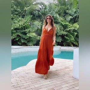 Beautiful terracota colores dress with crossed back!